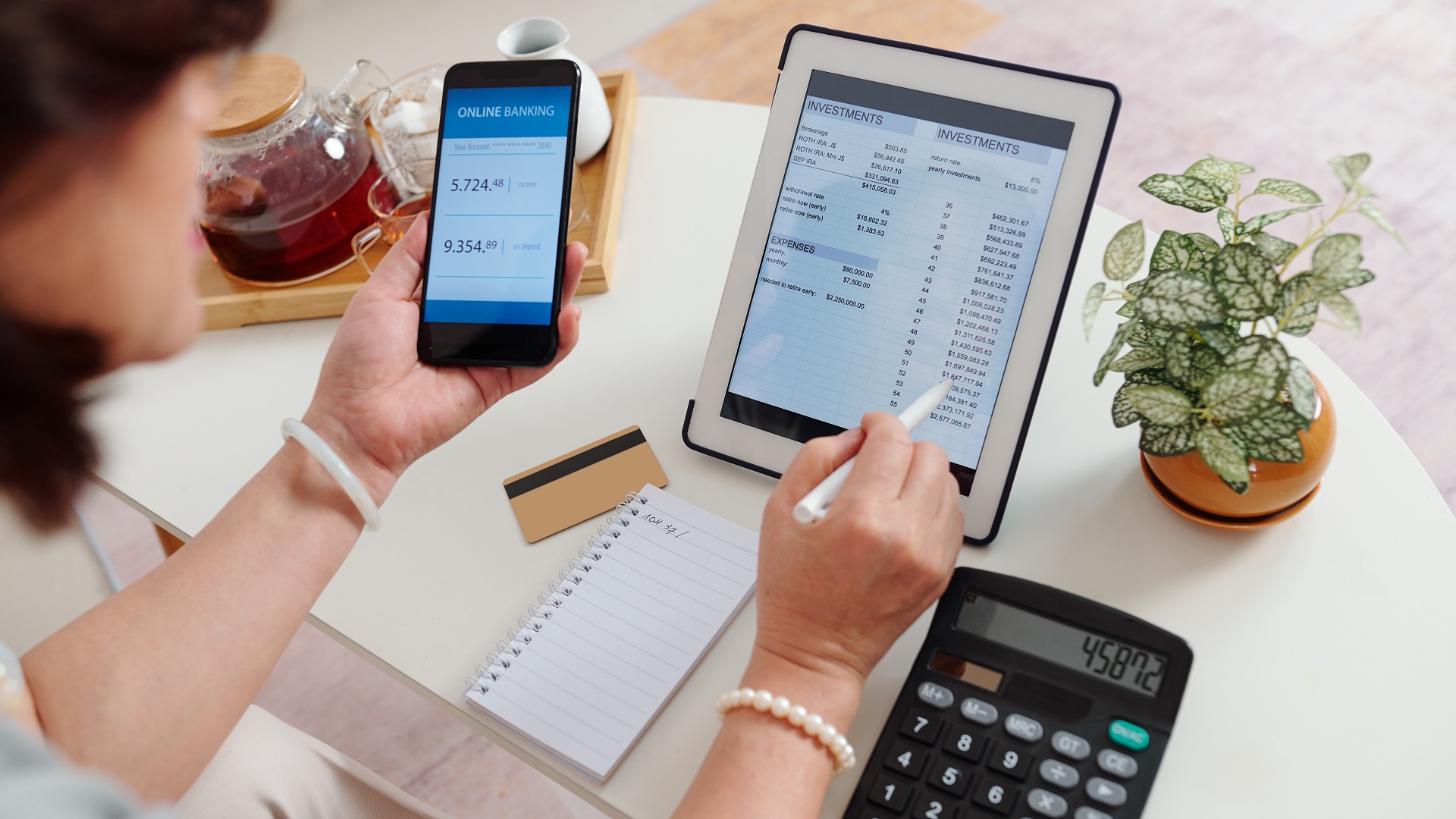 Woman checking brokerage account stock photo